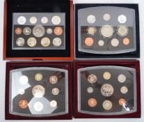 COLLECTION OF FOUR CASED PROOF COIN SETS