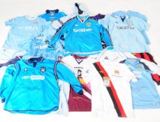 TWENTY FIVE MANCHESTER CITY FOOTBALL TOPS