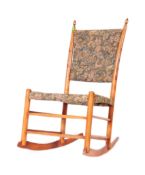 19TH CENTURY AESTHETIC MOVEMENT PASS THROUGH ROCKING CHAIR