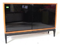 A RETRO VINTAGE TEAK WOOD GLAZED FRONTED BOOK CASE