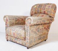 EARLY 20TH CENTURY UPHOLSTERED RECLINING ARMCHAIR