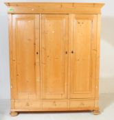 20TH CENTURY SCANDINAVIAN PINE TRIPLE WARDROBE ARMOIRE