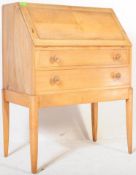 MANNER OF GORDEN RUSSELL - WALNUT MID CENTURY BUREAU