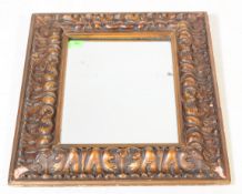 EARLY TO MID 20TH CENTURY GILT WALL MOUNTED MIRROR