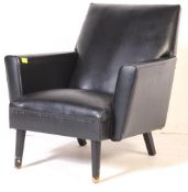A RETRO VINTAGE FULL BLACK VINYL ARM CHAIR WITH EBONISED LEGS