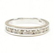 18CT WHITE GOLD & DIAMOND HALF ETERNITY RING