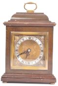 A VINTAGE 20TH CENTURY OAK CASED MANTLE CLOCK BY GARRARD & CO
