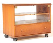 A RETRO VINTAGE MID 20TH CENTURY TEAK RECORD CABINET