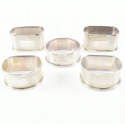 FIVE HALLMARKED SILVER NAPKIN RINGS
