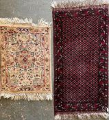 TWO EARLY 20TH CENTURY PERSIAN FLOOR PRAYER RUGS