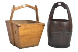 TWO LATE GEORGE III STAINED PINE PAILS / PEAT BUCKETS