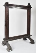 19TH CENTURY HIGH VICTORIAN MAHOGANY FRAMED FIRE SCREEN
