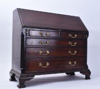MINIATURE GEORGE III STYLE MAHOGANY BUREAU