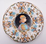 20TH CENTURY ITALIAN MAJOLICA PLATE FEATURING PAINTED BOY