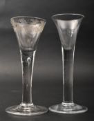 TWO GEORGE III 1770S CRYSTAL TALL STEM WINE GLASSES
