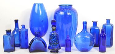 QUANTITY OF BLUE GLASS BOTTLES DECANTER & VASES
