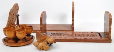 COLLECTION OF VINTAGE 20TH CENTURY CARVED WOOD BOOK HOLDERS