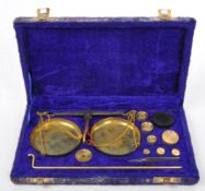 20TH CENTURY SMALL BRASS SCALES IN BOX WITH WEIGHTS