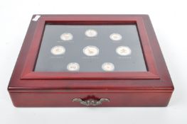 ELIZABETH II GOLD PLATED COLOUR HIGHLIGHTED COIN SETS