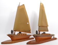 PAIR OF MID 20TH CENTURY WOODEN SAILING BOAT LAMPS