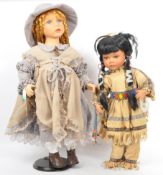 PAIR OF CERAMIC BISQUE HEAD DOLLS BY STEWART ROSS & ALBERON