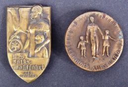 TWO WWII SECOND WORLD WAR GERMAN TINNIE BADGES