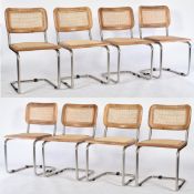 EIGHT VINTAGE RATTAN, OAK & WHITE METAL CANTILEVER CHAIRS