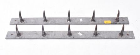 PAIR OF 20TH CENTURY STEEL BUTCHERS MEAT HOOKS