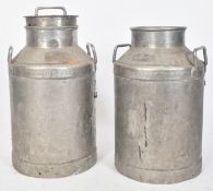 PAIR OF VINTAGE ALUMINIUM NESTLE MILK CHURNS