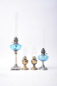 TWO VINTAGE FRENCH BLUE GLASS OIL LAMPS & PAIR OF OTHERS