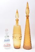 GENIE BOTTLES - TWO ITALIAN EMPOLI DECANTERS AND ONE OTHER