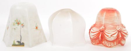 TRIO OF ART DECO PAINTED AND PRESSED GLASS LIGHT SHADES