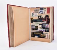 COLLECTION OF 20TH CENTURY CLOTHING LABELS IN ALBUM