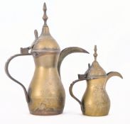 PAIR OF MATCHED VINTAGE BRASS ISLAMIC DALLAH COFFEE POTS