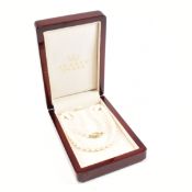 VINTAGE STRING OF CULTURED PEARLS WITH 9CT GOLD CLASP