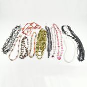 COLLECTION OF VINTAGE SHELL & GLASS BEAD NECKLACES