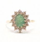 HALLMARKED 9CT GOLD EMERALD & WHITE STONE HALO DRESS RING