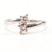 HALLMARKED 950 PLATINUM & DIAMOND CROSSOVER RING