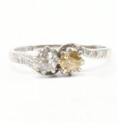 WHITE METAL TWO STONE CROSSOVER RING