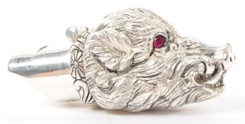WHITE METAL WHISTLE IN THE FORM OF A BOARS HEAD