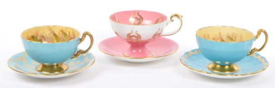 THREE PIECES AYNSLEY ORCHARD GOLD TEACUP & SAUCER