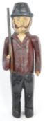 LATE 20TH CENTURY FOLK ART CARVED WOOD SOLDIER HUNTER STATUE