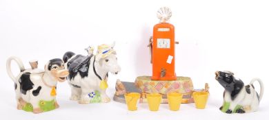 COLLECTION OF 20TH CENTURY CERAMIC NOVELTY DRINKING ITEMS