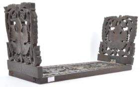 VINTAGE WALUT HINGED AND CARVED SLIDING BOOK SHELF