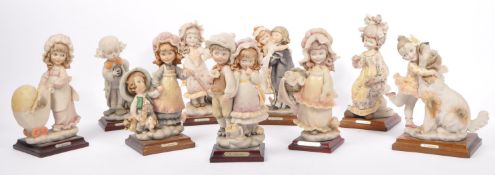 COLLECTION OF VINTAGE CAPODIMONTE ARMANI FIGURINES