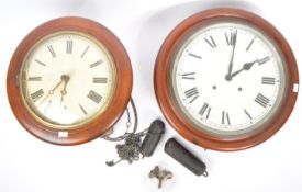 TWO EARLY 20TH CENTURY POST OFFICE MAHOGANY WALL CLOCKS