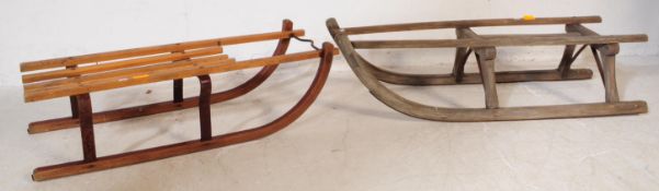 TWO VINTAGE BEECHWOOD & METAL SLEDGES SLEIGHS