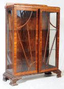 1930S ART DECO WALNUT SUNBURST ASTRAGAL GLAZED CABINET