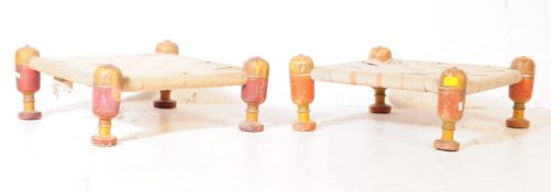 PAIR OF 20TH CENTURY INDIAN LOW STRAPWORK STOOLS