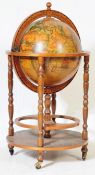 20TH CENTURY LIDDED GLOBE DRINKS CABINET ON STAND